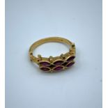 14ct yellow gold ornate ring with 2 rows of pink rubies, weight 3g and size L