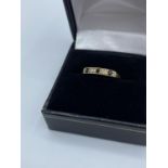 Vintage 9ct yellow gold ring with small sapphires and diamonds, size N and weight 1.22g approx