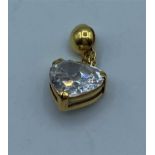 Stone set heart shaped pendant set in yellow gold, weight 3.45g and 2cm long approx