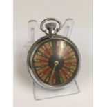 Vintage spinning gaming pocket watch with money wheel design on the face, in working order.