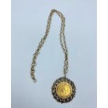 1892 Victoria gold Sovereign set in 9ct with a 33cm chain, total weight 19.6g