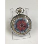 Vintage spinning gaming pocket watch with horse racing design on the face, in working order.