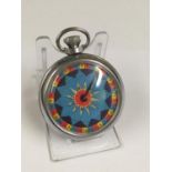 Vintage spinning gaming pocket watch with fire county design on the face, in working order.