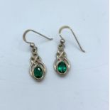 A Pair of Silver Drop Earring with Green Stone.