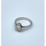 9ct white gold ring with pear shaped white sapphire stone in claw setting, weight 2.4g and size J