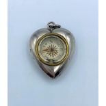 Vintage silver compact pendant in heart shape with full hallmarks on the back, weight 4.2g and