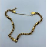 18ct yellow gold twist and link bracelet, weight 11.2g and 18cm long approx