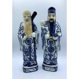 A Pair of Chinese Ceramic Figures Blue and White Glazed 32.5cm tall