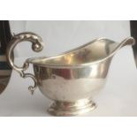 Antique silver creamer jug having scroll handle and gadroun rim, rare hallmark showing Edward VIII