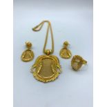 Jewellery set to include pendant on chain (46cm long) with matching earrings and ring (size R),