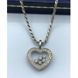 Chopard Geneve necklace and heart pendant with encrusted diamonds set in 18ct white gold in original