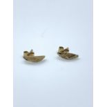 A pair of small leaf design 9ct gold earrings