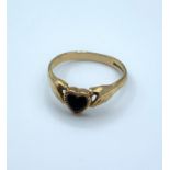 9ct gold ring with unusual design having 2 hands holding a heart, weight 2g and size O