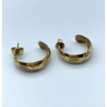A pair of 9ct gold earrings, weight 2.2g approx