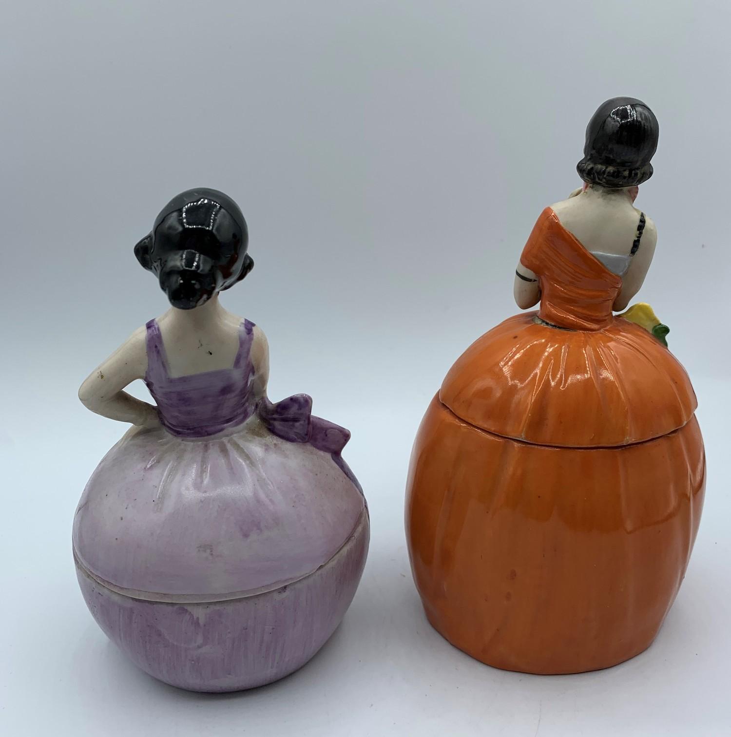 Vintage pair of Ceramic powder boxes in the form of ladies in orange and purple ballgown dresses - Image 5 of 20