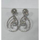 Pair of diamond earrings set in 18ct white gold, each earring has 161 diamonds of 1.91ct, total