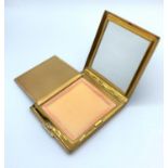 Vintage stratton compact gold colour with engine turned pattern and blank cartouche. Having a