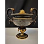 Heavy decorated gilt bronze urn, H23cm x W25cm and weight 10kg approx