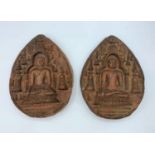 2x very early clay temple wall ornaments with detailed script and images. Pear shaped with repairs