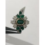 18k yellow gold ring with diamonds (0.9ct) and emeralds (7 stones with the largest 6x4mm approx),