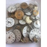 Large assortment of watch faces and movements. mostly antique some modern