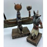 Anubis & Isis Egyptian statue figures, with leaflet. (2) sizes 21 & 23cm H x 32cm W