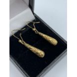 A pair of 9ct gold drop earrings, weight 1.4g