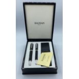 Balmain 2 pen presentation set in leather topped box and pocket pen holder. box 15cm W x 19cm H