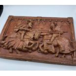 Marcus Designs vintage knights jousting relief plaque. Remnants of gilding red ceramic chalkware