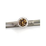 Platinum Ring 4.9g with diamonds 1.60cts (central stones 1.24ct, VS natural fancy brown diamond;