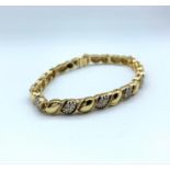 14k yellow gold diamond (approx 0.75ct) bracelet, weight 22.8g and approx 21cm long