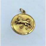 Vintage 9ct Gold Lion Pendant, weight 9.6g and 35mm diameter