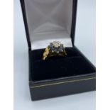 18ct Yellow Gold antique Ring with Diamond centre and Sapphire surround in claw set, size L and