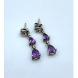 Pair of Vintage Silver drop Earrings having lavender coloured stones, weight 3.1g