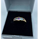 9CT YELLOW GOLD TOPAZ AND AMETHYST 5 STONE RING, SIZE M AND WEIGHT 2.4G