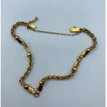 18ct yellow Gold twist and link Bracelet, weight 11.2g and 18cm long approx