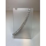 Silver Tennis Bracelet from QVC, set with Zirconias and having 43 stones, 19cm long clear marked