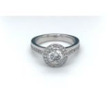 18K White Gold Ring with 1.08ct Diamonds with Centre Stone 0.70ct round brilliant (G/VS1) and 38