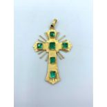 18ct Yellow Gold Cross in Sunburst style with 6 large Emerald stones, weight 11.6g and 6cm long