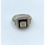 18ct Diamond encrusted Ring with black enamel (?) square, Size M