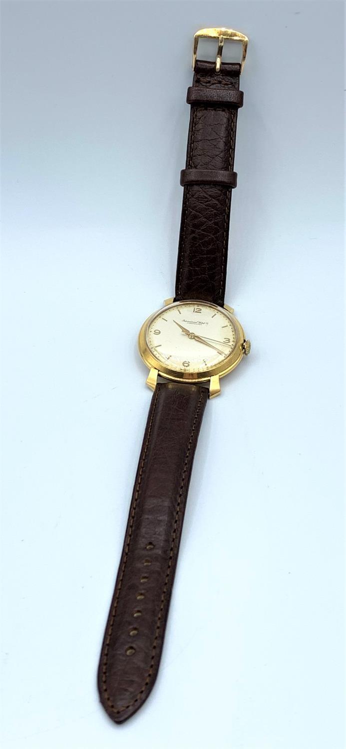 A vintage 18ct Yellow Gold IWC Schaffhausen Watch with leather strap, in working order, case 37mm - Image 11 of 12