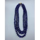 A 3 row Lapis Lazuli Necklace with faceted Lapis Lazuli beads and gold plated spacer Beads and