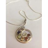 Stone set Silver Pendant and Chain, the pendant having a scroll shape and seven coloured stones (