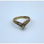 A 9ct yellow Gold 3 band Chevron Ring with small Diamond centre stone, weight 1.9g and size L/M