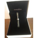 Pandora Silver link Chain Bracelet, having 6 strands of silver chain with the Pandora logo on the