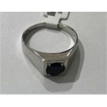 9K White Gold Gents Ring with round dark blue Sapphire (Australia) approx 1ct, weight 4.7g and