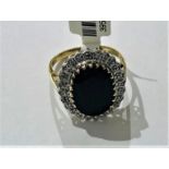 9K Yellow Gold Ring with dark blue Sapphire (14x11mm), weight 4.9g and size O (ECN 603)