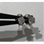 Pair of 17K White Gold Studs Earrings with 0.23ct eound brilliant Diamond (E/VS2) on each stud, with
