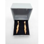 A Pair Of 9ct Drop Earrings 65g