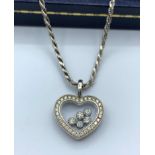 Chopard Geneve Necklace and heart pendant with encrusted Diamonds set in 18ct White Gold in original